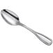 An Acopa Saxton stainless steel demitasse spoon with a silver handle and spoon.
