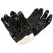 A pair of Cordova black PVC gloves with interlock lining.