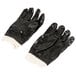 A pair of black Cordova PVC gloves with interlock lining.