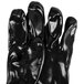 A pair of Cordova black PVC gloves.