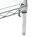 A Metro chrome wire shelving unit with four metal shelves.