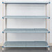 A MetroMax Q shelving unit with blue and gray shelves.