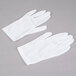 A pair of Cordova Men's white inspector gloves.