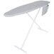 A white ironing board with a silver silicone-coated cover and a pocket on it.