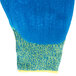 A blue and yellow Cordova iON A4 work glove with a blue crinkle latex palm coating.