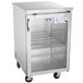 An Avantco stainless steel back bar refrigerator with a glass door.