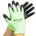 A pair of large lime green Cordova warehouse gloves with black foam nitrile coating on the palms.