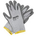 A pair of Cordova grey cut resistant gloves with a gray palm coating.