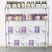A Metro Super Erecta chrome wire shelving unit with bottles and boxes on the shelves.