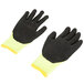 A pair of black and yellow Cordova Monarch heavy duty work gloves with black foam latex palms.