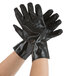 A pair of black Cordova PVC gloves with jersey lining.