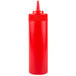 A red plastic bottle with a lid and spout.