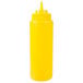 A yellow Choice wide mouth squeeze bottle with a lid.