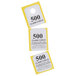 A box of 500 yellow Choice paper coat check tickets.