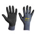 A pair of black and gray Cordova ActivGrip Advance gloves with black palm coating over a gray nylon.