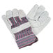 A pair of Cordova work gloves with red and blue stripes on the canvas cuffs and leather palms.