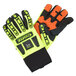 A pair of lime green and yellow Cordova heavy duty work gloves with orange accents.