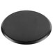 A black circle shaped Matfer Bourgeat carbon steel pizza pan.