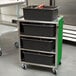 A stainless steel Lakeside utility cart with green shelves.