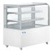 An Avantco white curved glass dry bakery display case on wheels.