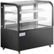 An Avantco black refrigerated bakery display case with curved clear glass.