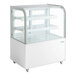 A white Avantco refrigerated bakery display case with curved glass doors and three shelves.