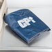 A blue fabric dust cover with white text for Campus Products GP8 Glass Polisher on a metal surface.
