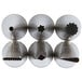 A group of shiny metal Ateco stainless steel piping tips.