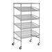 A chrome wire shelving unit with angled shelves on wheels.