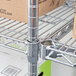 A Metro Super Erecta chrome wire shelf with boxes on it.