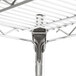 A close-up of a Metro Super Erecta wire shelf with metal hooks.