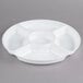 A Fineline white plastic round tray with four sections.