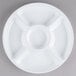 A white plastic Fineline Platter Pleasers tray with 5 compartments.