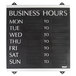 A black Headline Sign business hours sign with white text on a white background.