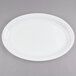 A white Fineline oval plastic catering tray.