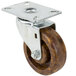 A Channel CPS54H swivel plate caster with a brown metal wheel.