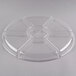 A Fineline clear plastic circular tray with 7 compartments.