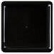 A black plastic square catering tray with a small white circle in the middle.