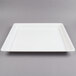 A white square Fineline Platter Pleasers tray.