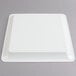 A white Fineline square plastic catering tray with a lid.