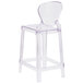 A clear plastic counter height stool with a clear tear back.