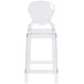 A clear plastic chair with a backrest.