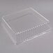 A clear plastic Fineline square dome lid on a white background.