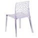 A Flash Furniture clear polycarbonate side chair with legs.