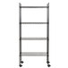 A black metal wire shelving unit with casters.