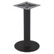 A BFM Seating black metal counter height table base with a square bottom.