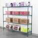 A Metroseal wire shelving unit with 4 shelves holding white, pink, and brown boxes.