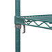 A Metroseal wire shelving unit with green shelves and metal shelves.