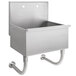 A stainless steel Advance Tabco wall mounted utility sink with a drain and pipe.