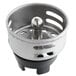 A stainless steel Regency basket strainer with black rubber stopper in a sink drain.